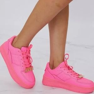 Hot pink chain platform sneakers